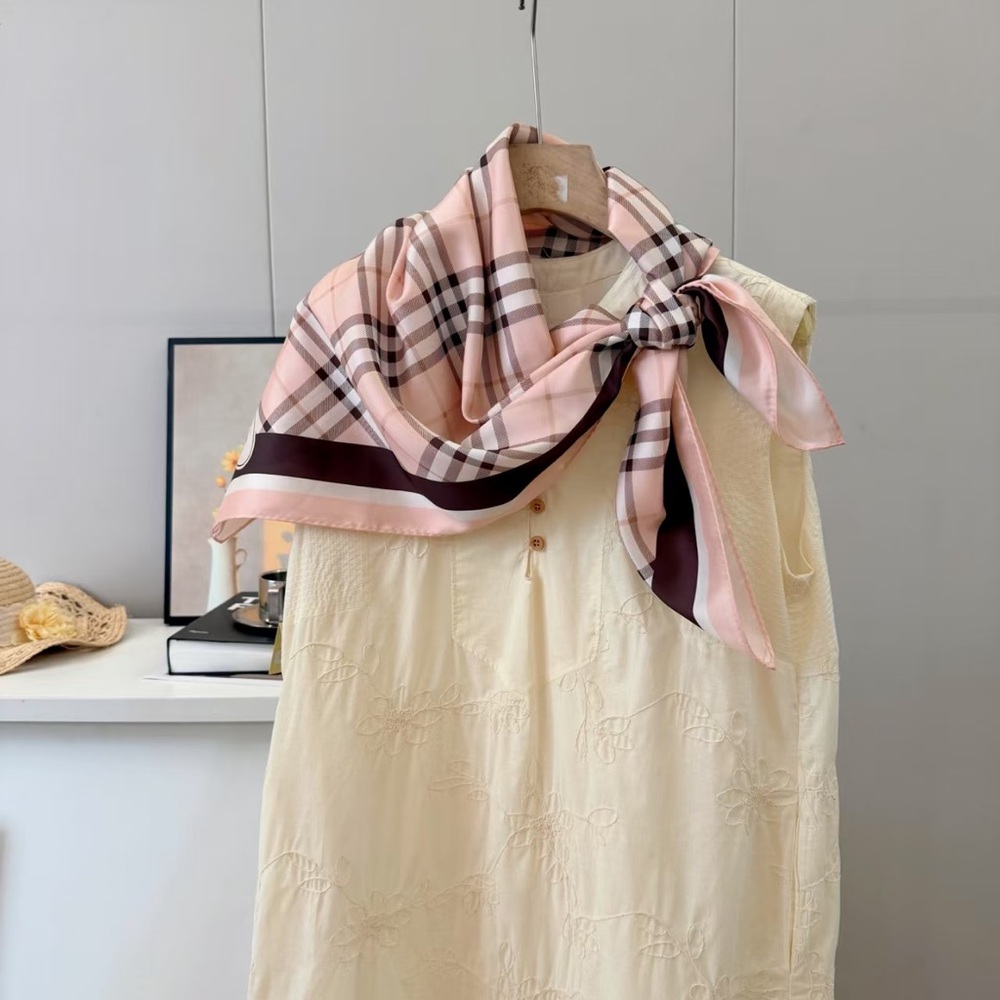 Burberry Women's Pink Plaid Silk Scarf Draped over Cream Dress